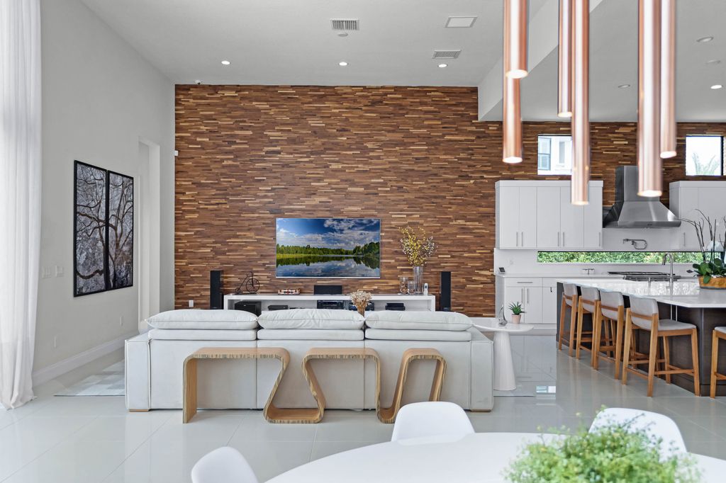 4066 Isabella Circle, Windermere, Florida is a spectacular home with beautiful porcelain floors, high-end appliances, accent wall, expensive light features, and an amazing backyard and gorgeous views.
