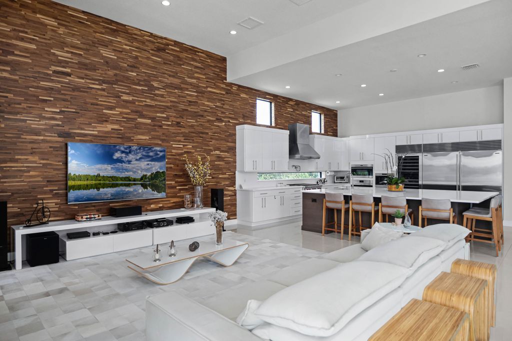 4066 Isabella Circle, Windermere, Florida is a spectacular home with beautiful porcelain floors, high-end appliances, accent wall, expensive light features, and an amazing backyard and gorgeous views.