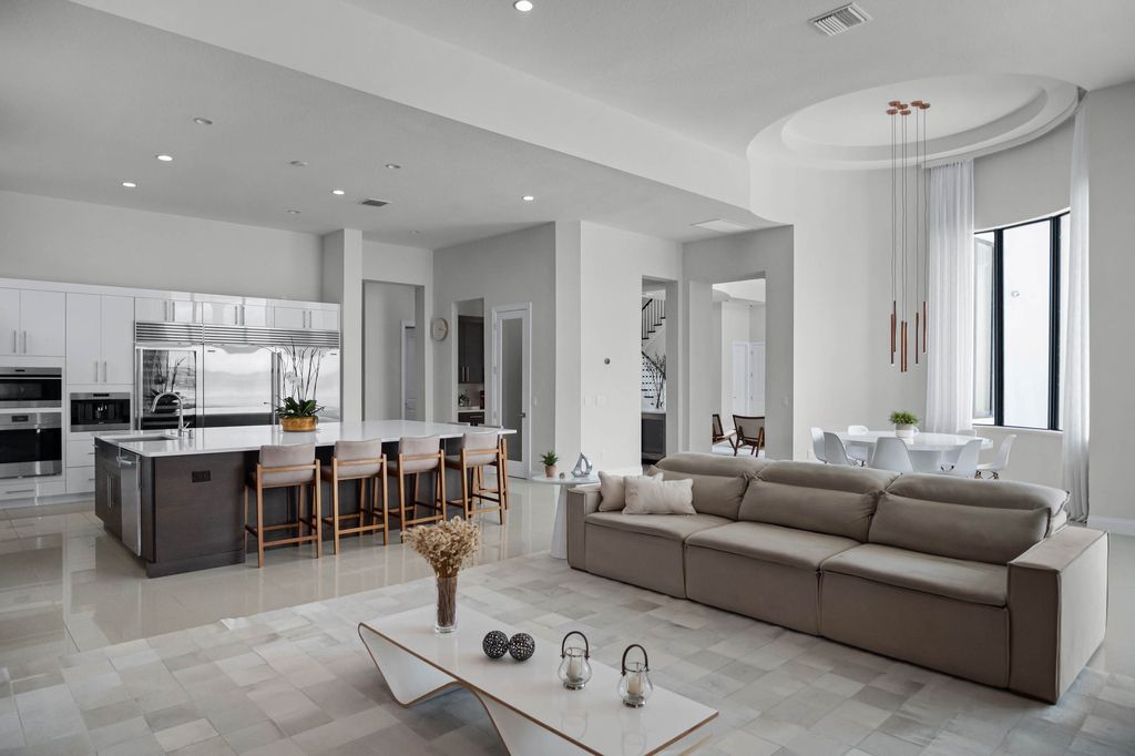 4066 Isabella Circle, Windermere, Florida is a spectacular home with beautiful porcelain floors, high-end appliances, accent wall, expensive light features, and an amazing backyard and gorgeous views.