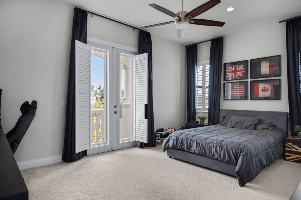 4066 Isabella Circle, Windermere, Florida is a spectacular home with beautiful porcelain floors, high-end appliances, accent wall, expensive light features, and an amazing backyard and gorgeous views.