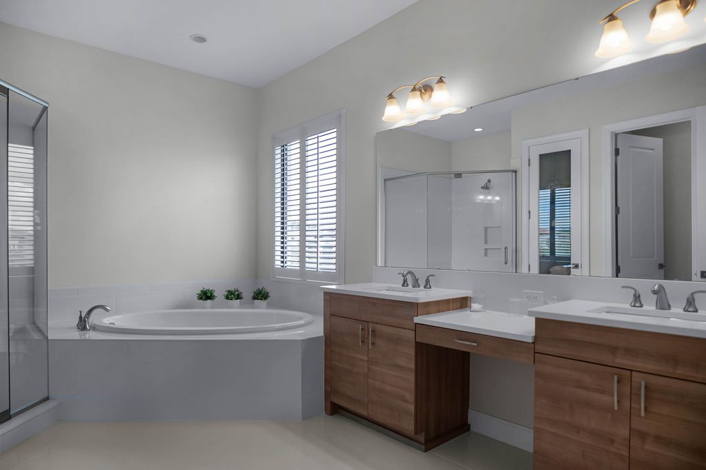 4066 Isabella Circle, Windermere, Florida is a spectacular home with beautiful porcelain floors, high-end appliances, accent wall, expensive light features, and an amazing backyard and gorgeous views.