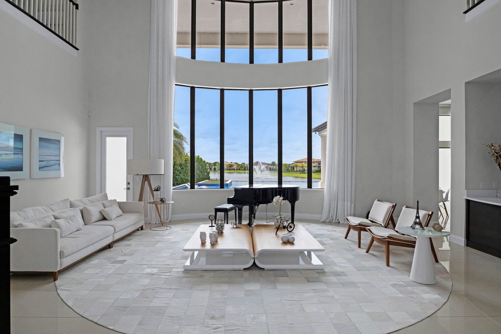 4066 Isabella Circle, Windermere, Florida is a spectacular home with beautiful porcelain floors, high-end appliances, accent wall, expensive light features, and an amazing backyard and gorgeous views.