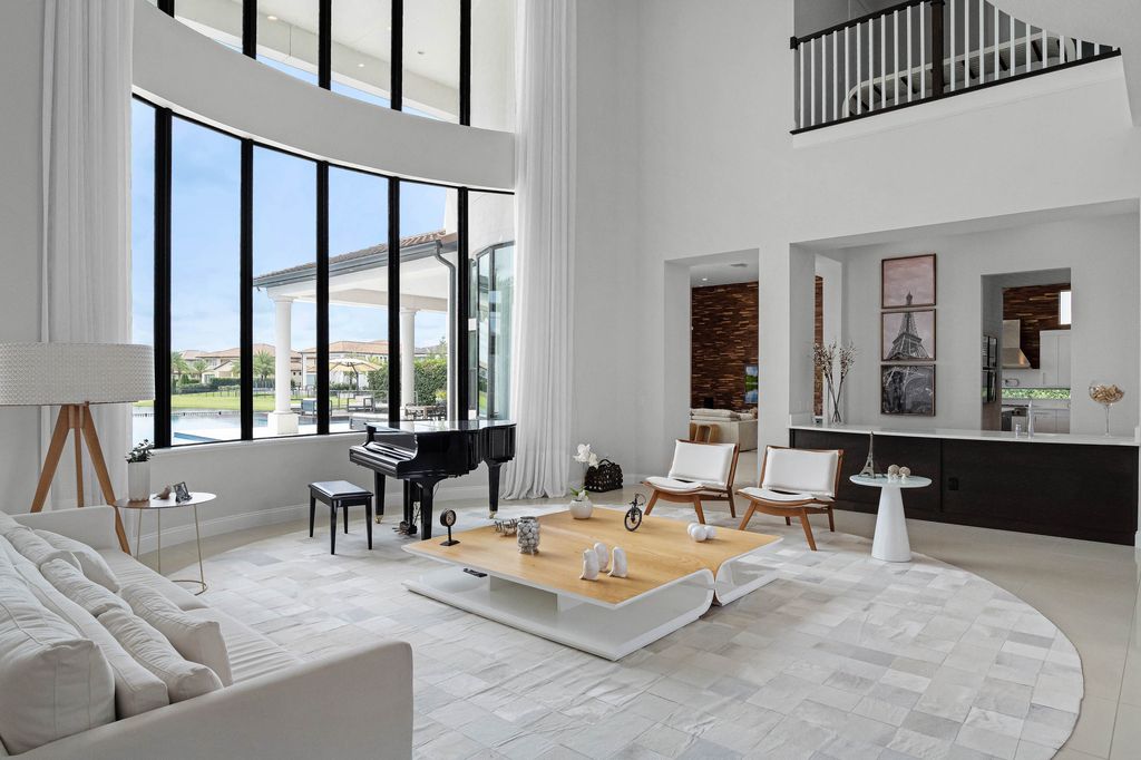 4066 Isabella Circle, Windermere, Florida is a spectacular home with beautiful porcelain floors, high-end appliances, accent wall, expensive light features, and an amazing backyard and gorgeous views.