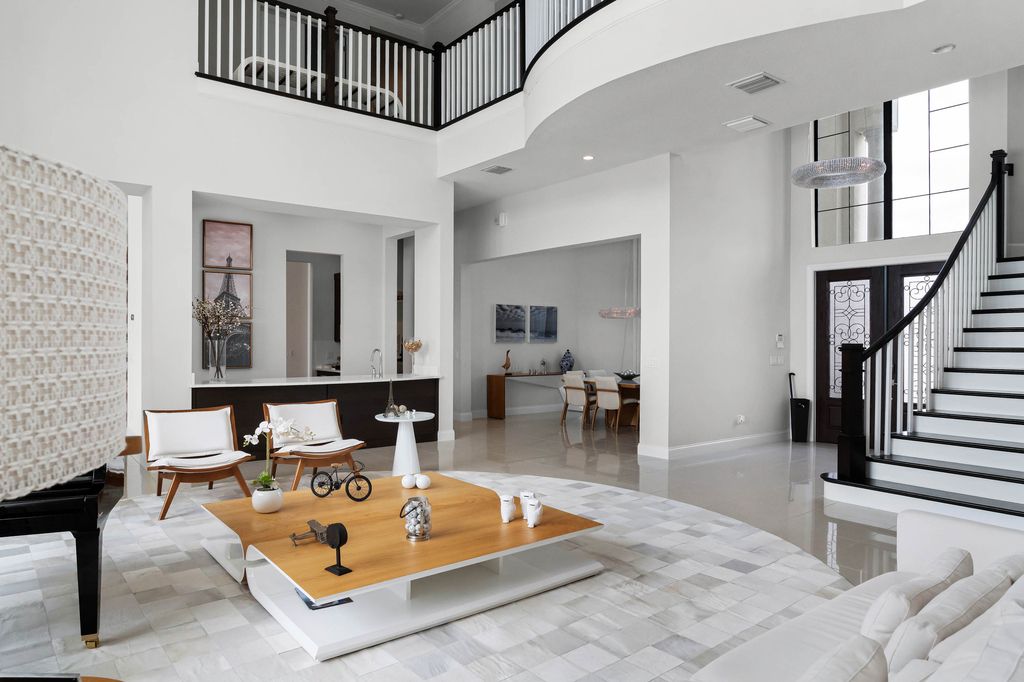 4066 Isabella Circle, Windermere, Florida is a spectacular home with beautiful porcelain floors, high-end appliances, accent wall, expensive light features, and an amazing backyard and gorgeous views.