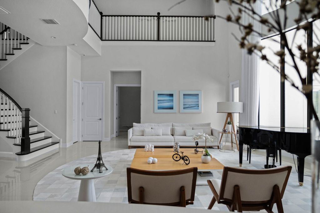 4066 Isabella Circle, Windermere, Florida is a spectacular home with beautiful porcelain floors, high-end appliances, accent wall, expensive light features, and an amazing backyard and gorgeous views.