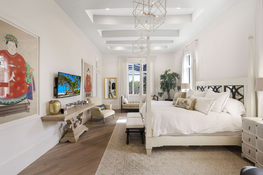 26171 Woodlyn Drive, Bonita Springs, Florida is a contemporary masterpiece with every detail considered for style and comfort, Luxury features include honed porcelain tile, whitewashed oak flooring, state of the art kitchen, stunning wet bar & fireplace, outdoor kitchen, custom pool, outdoor fireplace, and much more.