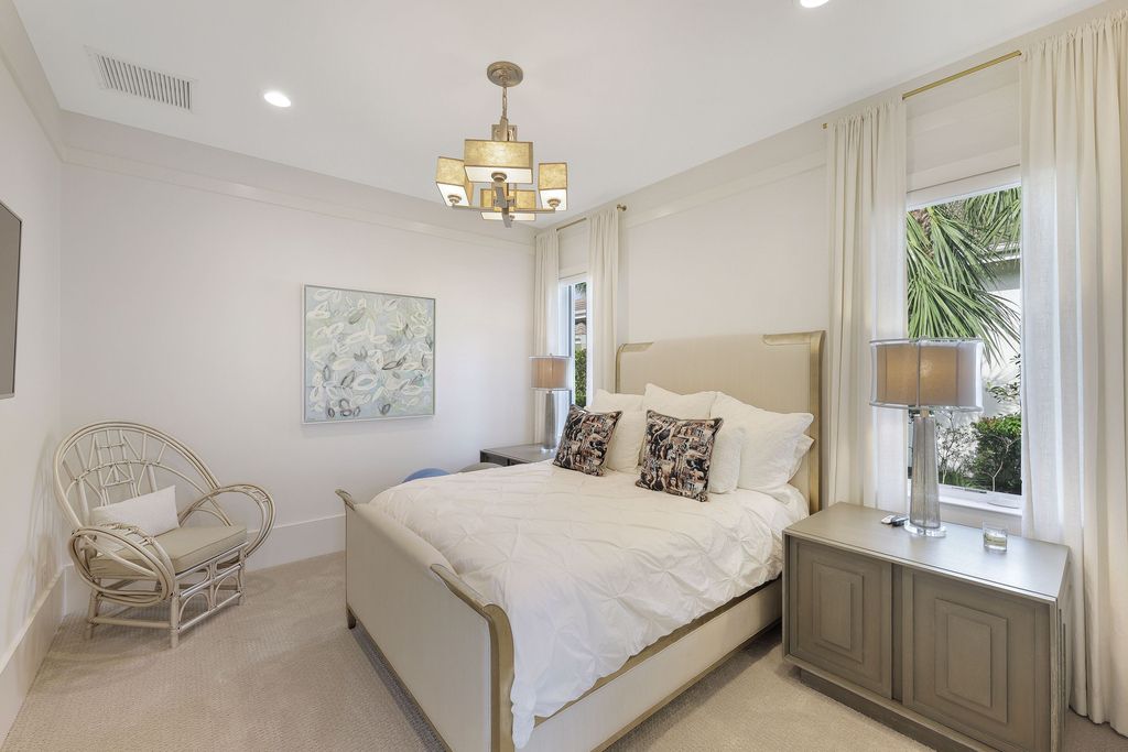 26171 Woodlyn Drive, Bonita Springs, Florida is a contemporary masterpiece with every detail considered for style and comfort, Luxury features include honed porcelain tile, whitewashed oak flooring, state of the art kitchen, stunning wet bar & fireplace, outdoor kitchen, custom pool, outdoor fireplace, and much more.