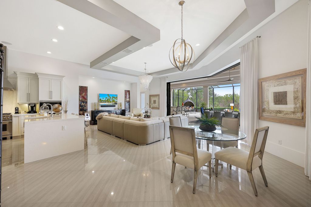 26171 Woodlyn Drive, Bonita Springs, Florida is a contemporary masterpiece with every detail considered for style and comfort, Luxury features include honed porcelain tile, whitewashed oak flooring, state of the art kitchen, stunning wet bar & fireplace, outdoor kitchen, custom pool, outdoor fireplace, and much more.