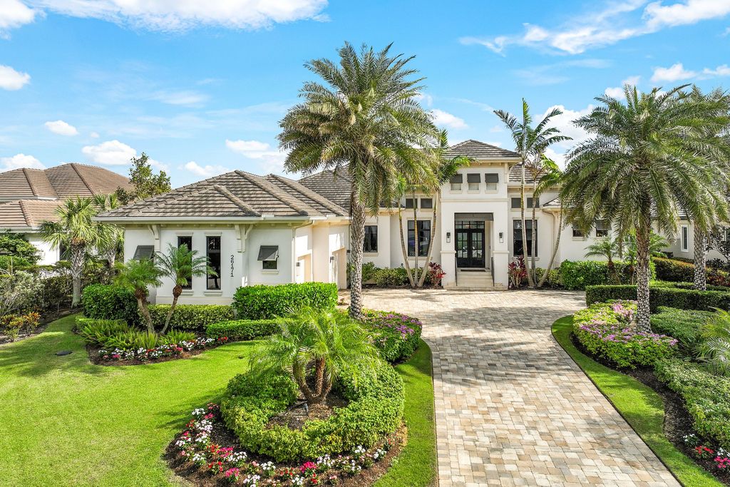 26171 Woodlyn Drive, Bonita Springs, Florida is a contemporary masterpiece with every detail considered for style and comfort, Luxury features include honed porcelain tile, whitewashed oak flooring, state of the art kitchen, stunning wet bar & fireplace, outdoor kitchen, custom pool, outdoor fireplace, and much more.