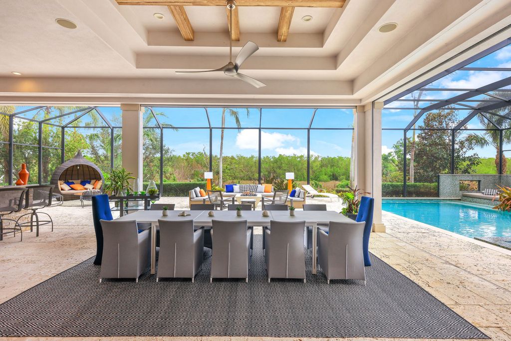 26171 Woodlyn Drive, Bonita Springs, Florida is a contemporary masterpiece with every detail considered for style and comfort, Luxury features include honed porcelain tile, whitewashed oak flooring, state of the art kitchen, stunning wet bar & fireplace, outdoor kitchen, custom pool, outdoor fireplace, and much more.