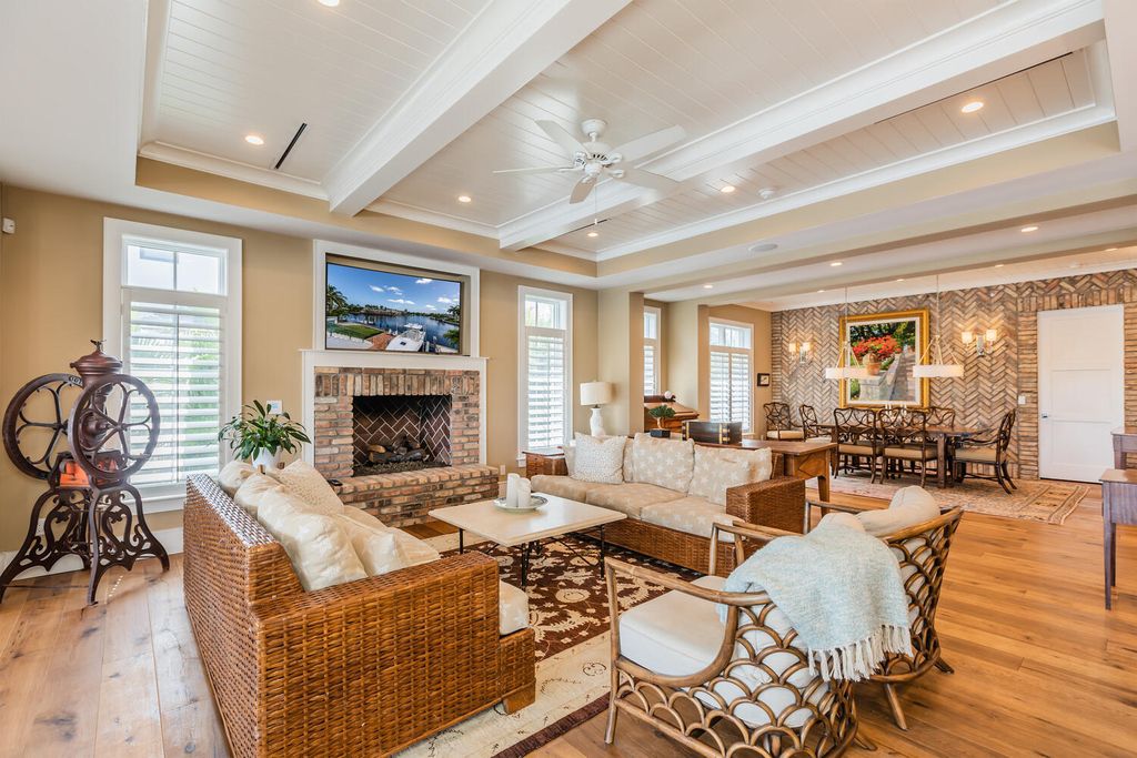 481 21st Ave S, Naples, Florida is a one-of-a-kind estate nestled along the widest canal in Aqualane Shore with hardwood flooring, shiplap siding and outstanding finishes, enhanced by mesmerizing water views.