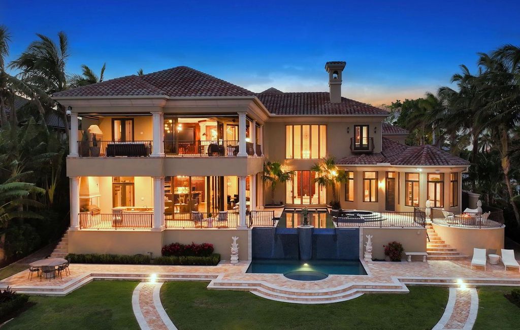 1436 John Ringling Parkway, Sarasota, Florida is a magnificent home in the coveted neighborhood of Lido Shores with impressive architectural details, beautiful chandeliers, custom woodwork, and pristine views of Sarasota Bay.