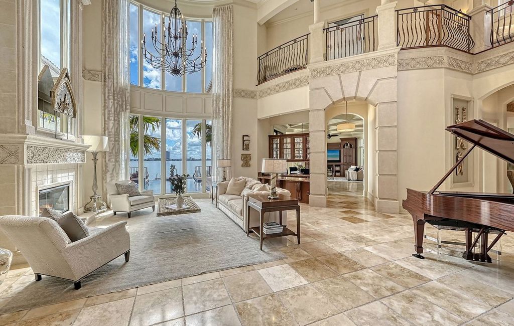 1436 John Ringling Parkway, Sarasota, Florida is a magnificent home in the coveted neighborhood of Lido Shores with impressive architectural details, beautiful chandeliers, custom woodwork, and pristine views of Sarasota Bay.