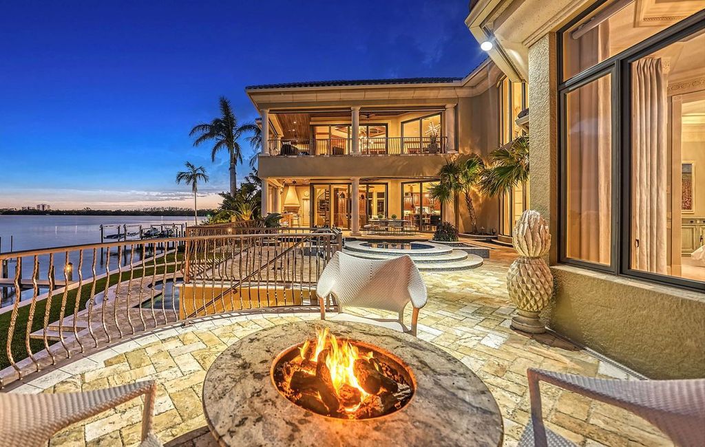 1436 John Ringling Parkway, Sarasota, Florida is a magnificent home in the coveted neighborhood of Lido Shores with impressive architectural details, beautiful chandeliers, custom woodwork, and pristine views of Sarasota Bay.