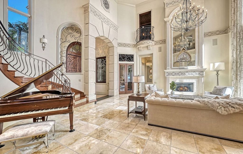 1436 John Ringling Parkway, Sarasota, Florida is a magnificent home in the coveted neighborhood of Lido Shores with impressive architectural details, beautiful chandeliers, custom woodwork, and pristine views of Sarasota Bay.