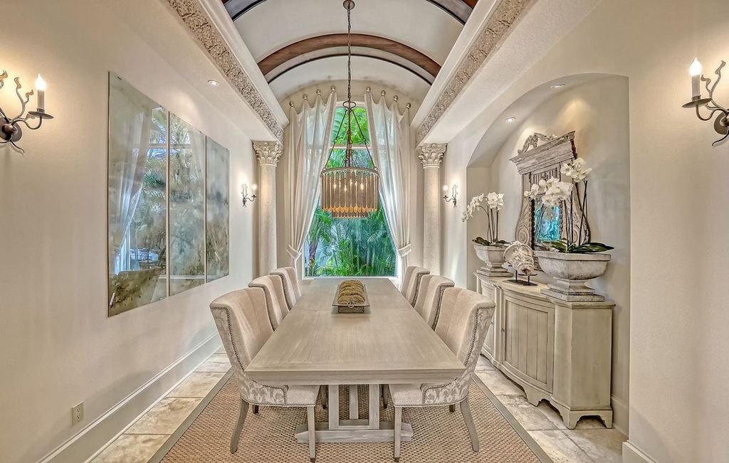 1436 John Ringling Parkway, Sarasota, Florida is a magnificent home in the coveted neighborhood of Lido Shores with impressive architectural details, beautiful chandeliers, custom woodwork, and pristine views of Sarasota Bay.
