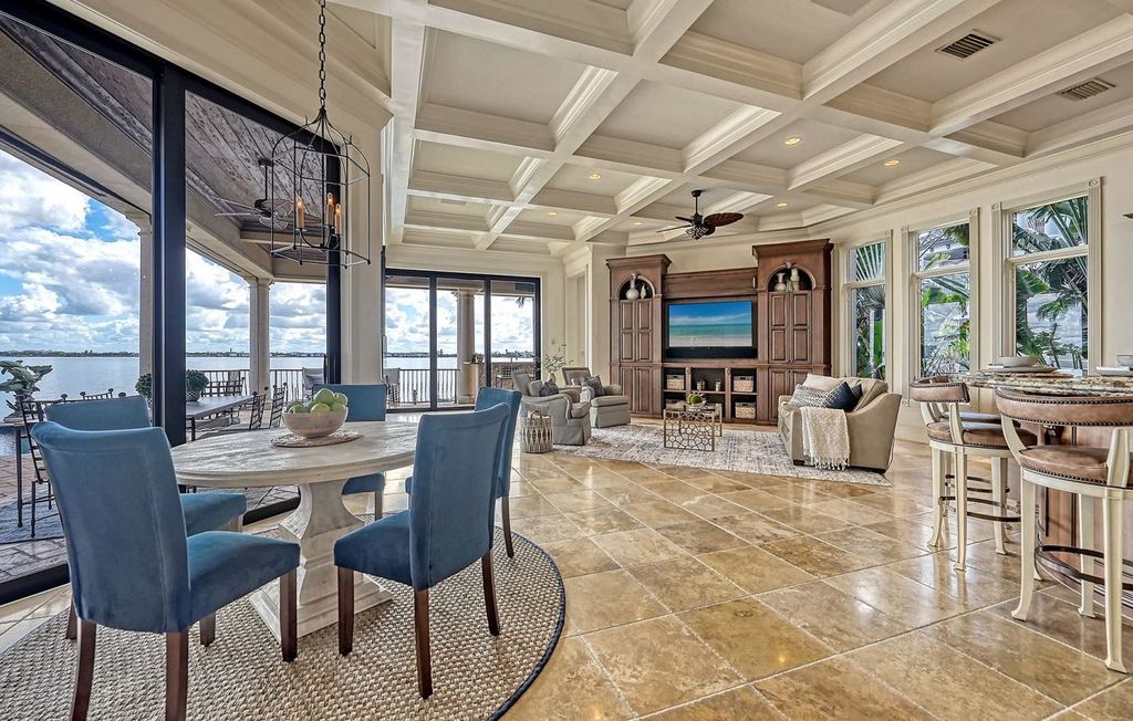 1436 John Ringling Parkway, Sarasota, Florida is a magnificent home in the coveted neighborhood of Lido Shores with impressive architectural details, beautiful chandeliers, custom woodwork, and pristine views of Sarasota Bay.