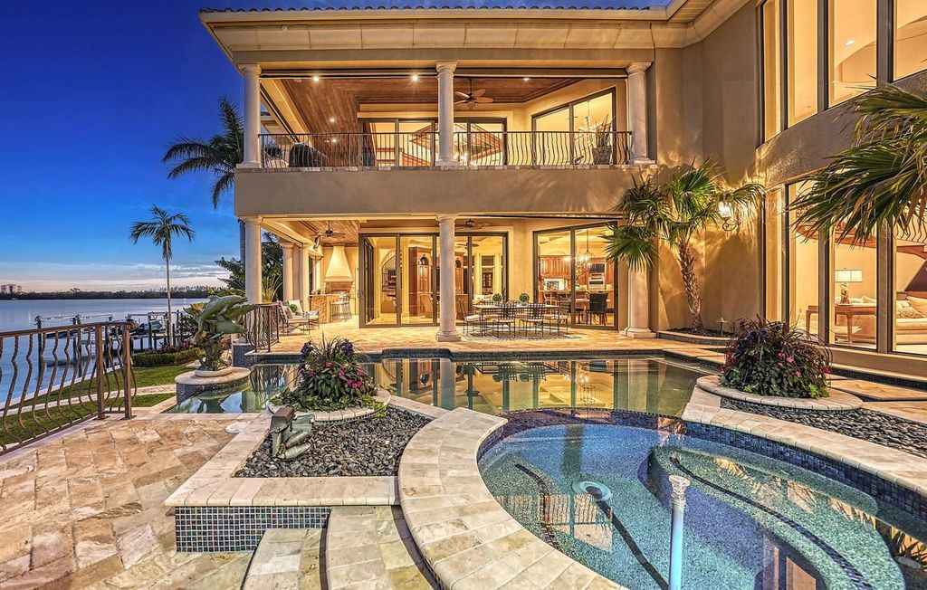 1436 John Ringling Parkway, Sarasota, Florida is a magnificent home in the coveted neighborhood of Lido Shores with impressive architectural details, beautiful chandeliers, custom woodwork, and pristine views of Sarasota Bay.