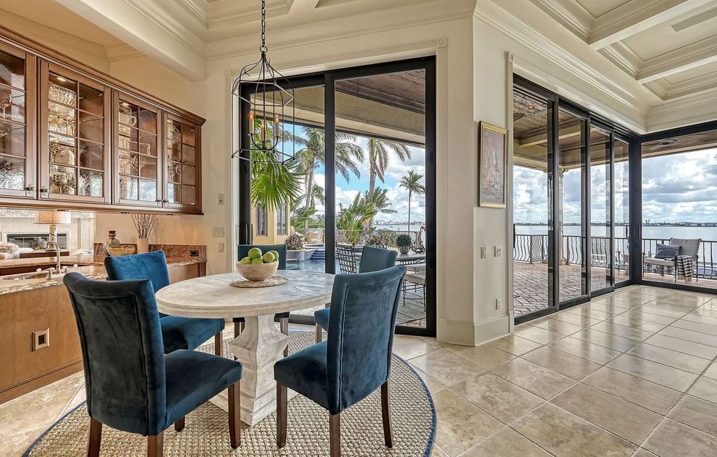 1436 John Ringling Parkway, Sarasota, Florida is a magnificent home in the coveted neighborhood of Lido Shores with impressive architectural details, beautiful chandeliers, custom woodwork, and pristine views of Sarasota Bay.