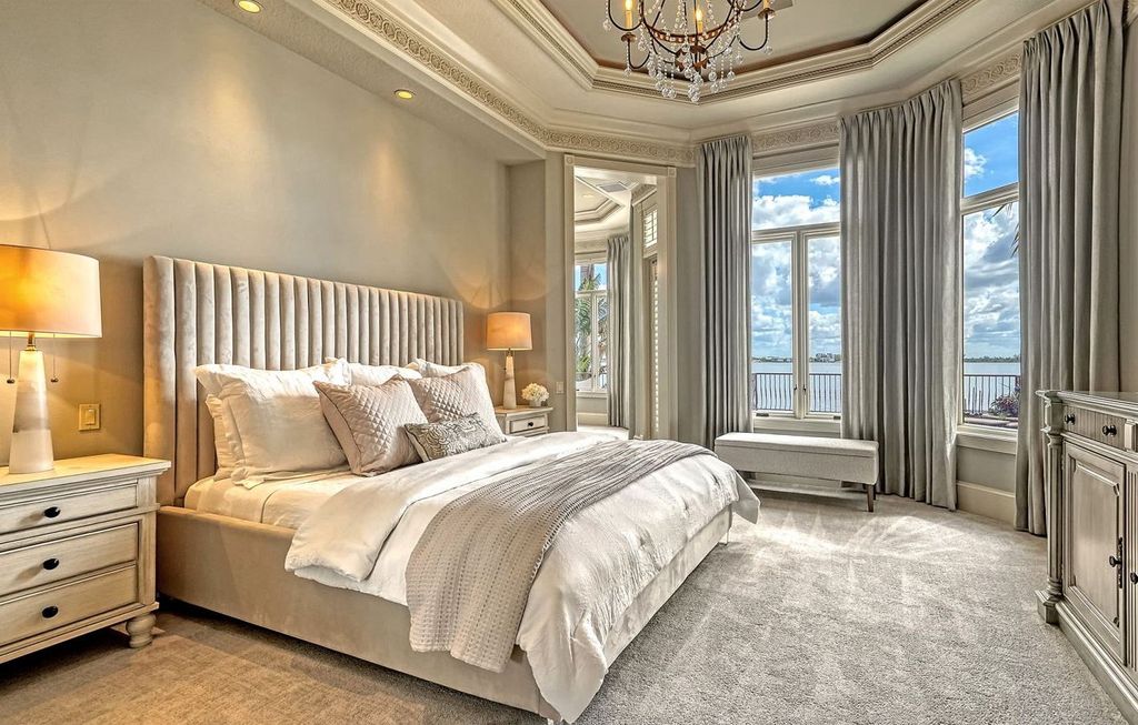 1436 John Ringling Parkway, Sarasota, Florida is a magnificent home in the coveted neighborhood of Lido Shores with impressive architectural details, beautiful chandeliers, custom woodwork, and pristine views of Sarasota Bay.