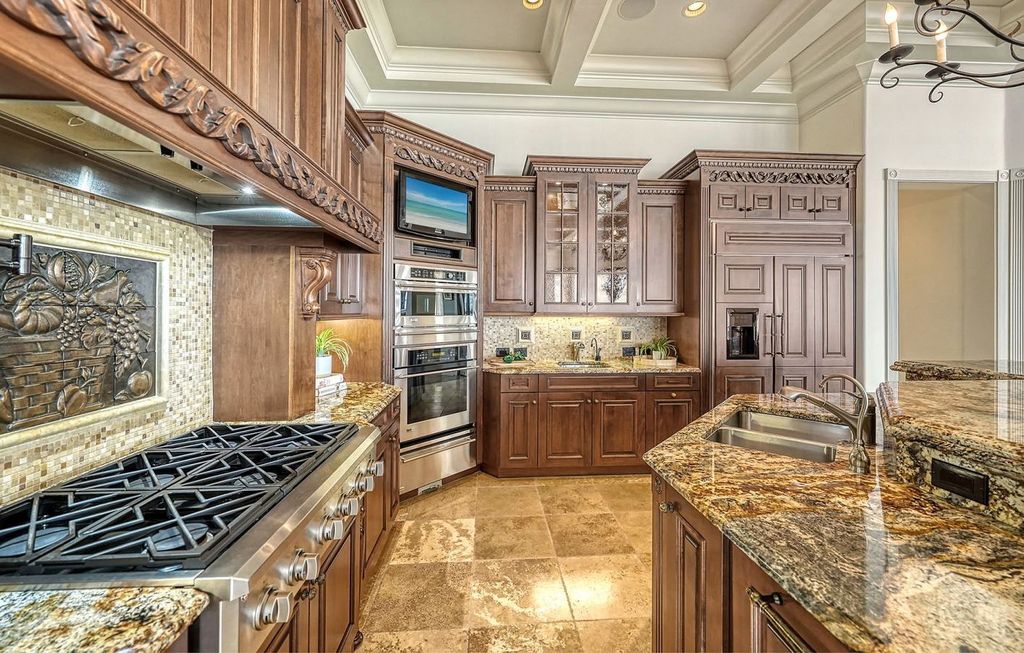 1436 John Ringling Parkway, Sarasota, Florida is a magnificent home in the coveted neighborhood of Lido Shores with impressive architectural details, beautiful chandeliers, custom woodwork, and pristine views of Sarasota Bay.