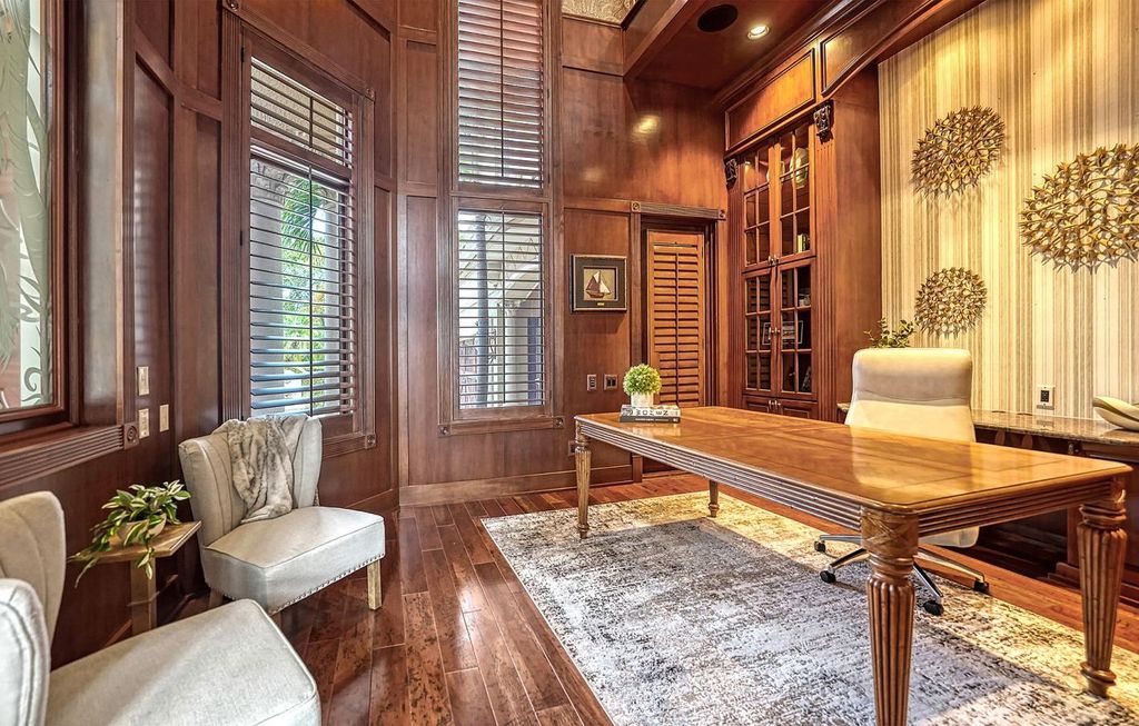1436 John Ringling Parkway, Sarasota, Florida is a magnificent home in the coveted neighborhood of Lido Shores with impressive architectural details, beautiful chandeliers, custom woodwork, and pristine views of Sarasota Bay.