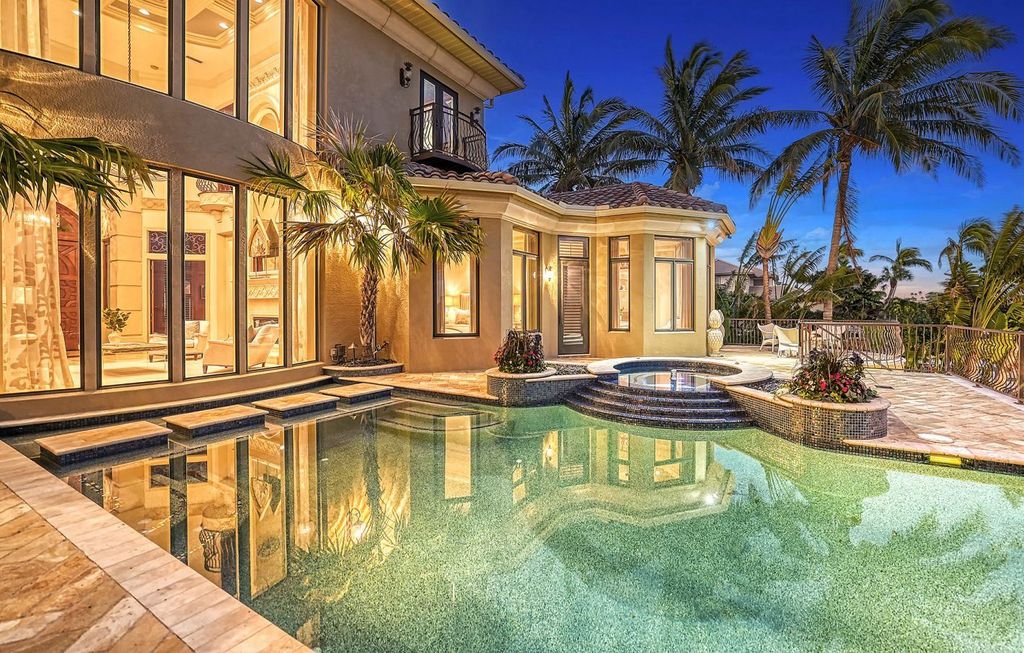 1436 John Ringling Parkway, Sarasota, Florida is a magnificent home in the coveted neighborhood of Lido Shores with impressive architectural details, beautiful chandeliers, custom woodwork, and pristine views of Sarasota Bay.