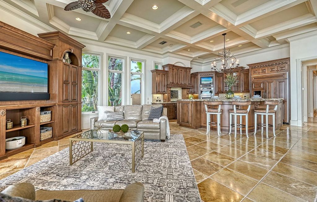 1436 John Ringling Parkway, Sarasota, Florida is a magnificent home in the coveted neighborhood of Lido Shores with impressive architectural details, beautiful chandeliers, custom woodwork, and pristine views of Sarasota Bay.