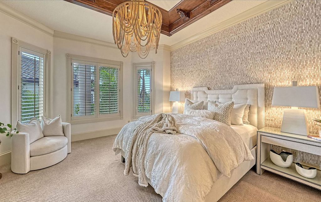 1436 John Ringling Parkway, Sarasota, Florida is a magnificent home in the coveted neighborhood of Lido Shores with impressive architectural details, beautiful chandeliers, custom woodwork, and pristine views of Sarasota Bay.