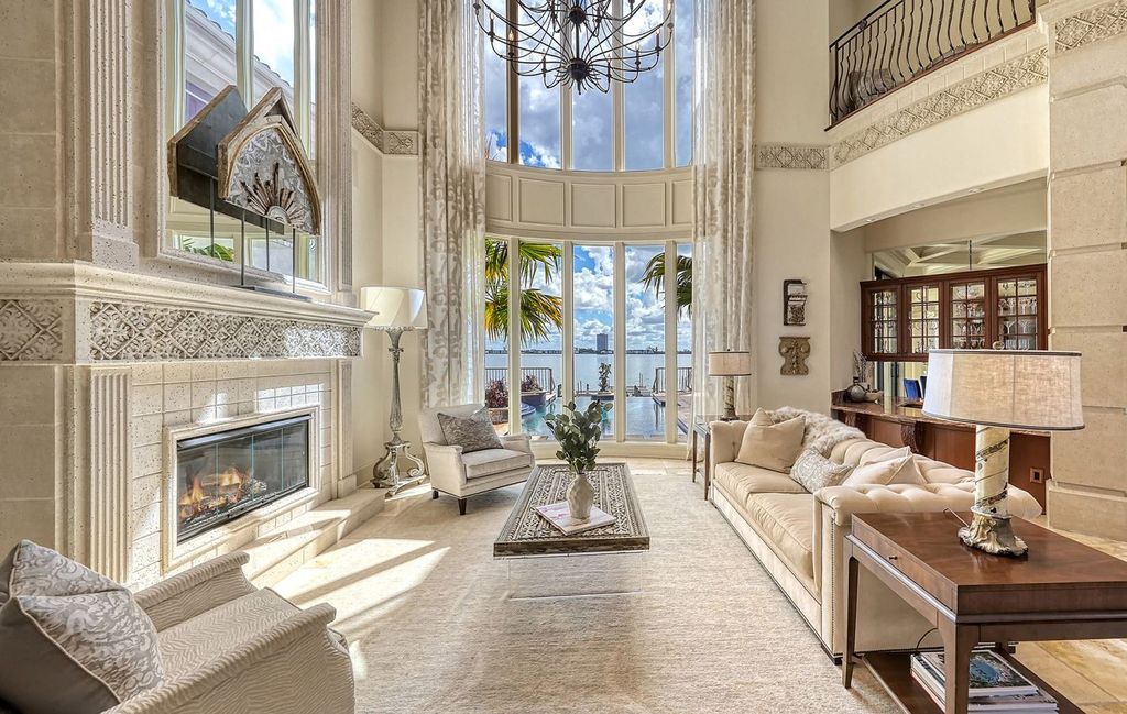 1436 John Ringling Parkway, Sarasota, Florida is a magnificent home in the coveted neighborhood of Lido Shores with impressive architectural details, beautiful chandeliers, custom woodwork, and pristine views of Sarasota Bay.