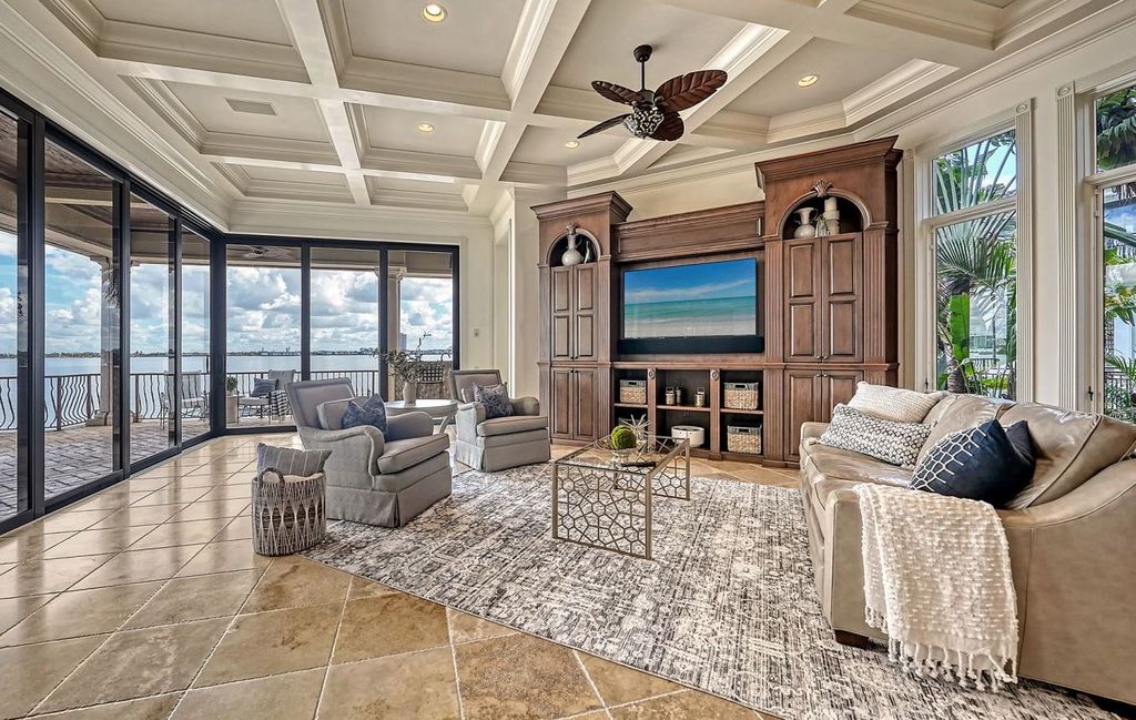 1436 John Ringling Parkway, Sarasota, Florida is a magnificent home in the coveted neighborhood of Lido Shores with impressive architectural details, beautiful chandeliers, custom woodwork, and pristine views of Sarasota Bay.