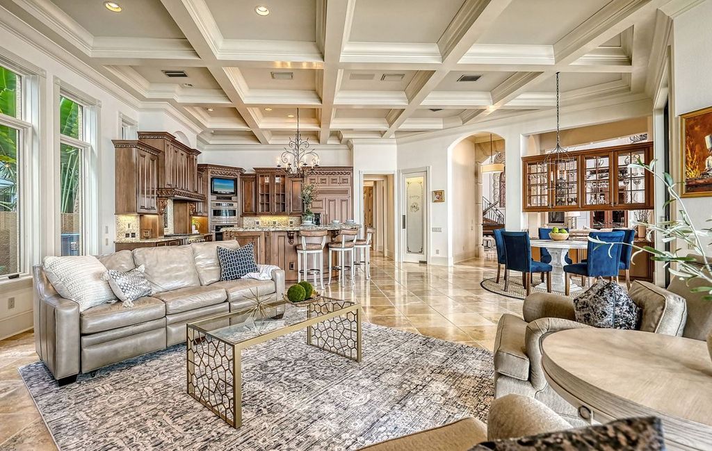 1436 John Ringling Parkway, Sarasota, Florida is a magnificent home in the coveted neighborhood of Lido Shores with impressive architectural details, beautiful chandeliers, custom woodwork, and pristine views of Sarasota Bay.