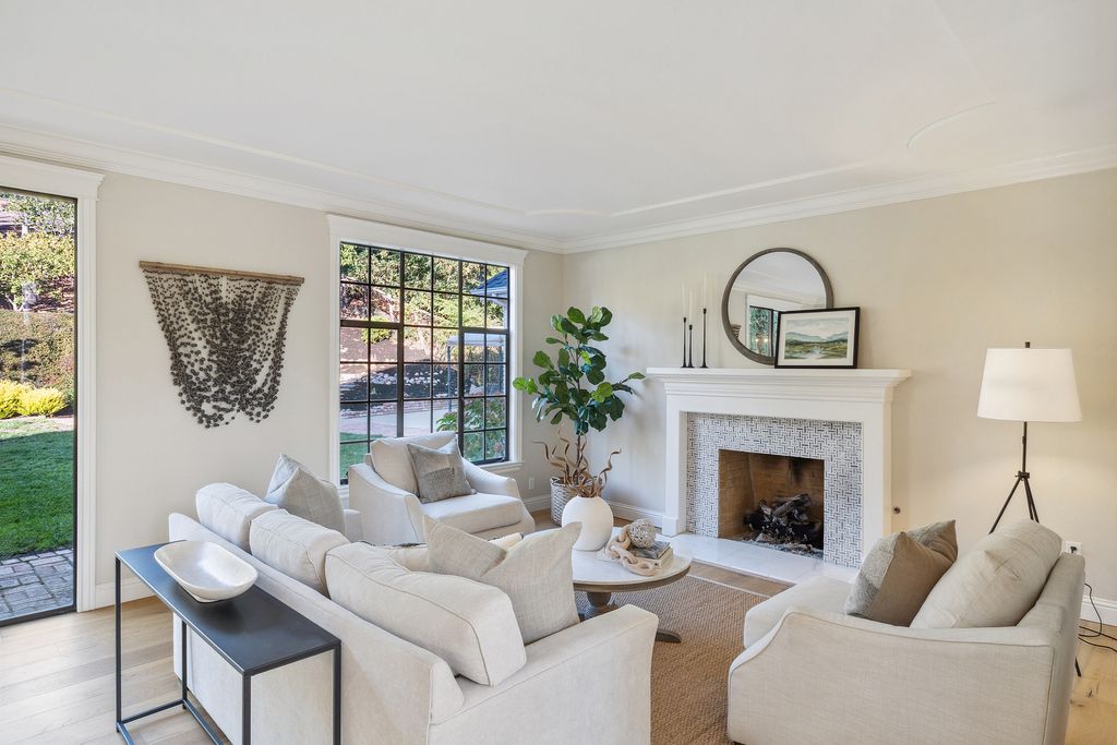 1941 Parkmont Drive, Alamo, California is beautiful remodeled custom home features a resort-like backyard with pool, spa, outdoor kitchen, built-in fire pit, bocce court, expansive level grassy area to play, sport court location, producing vineyard, vegetable garden beds, & fruit trees.