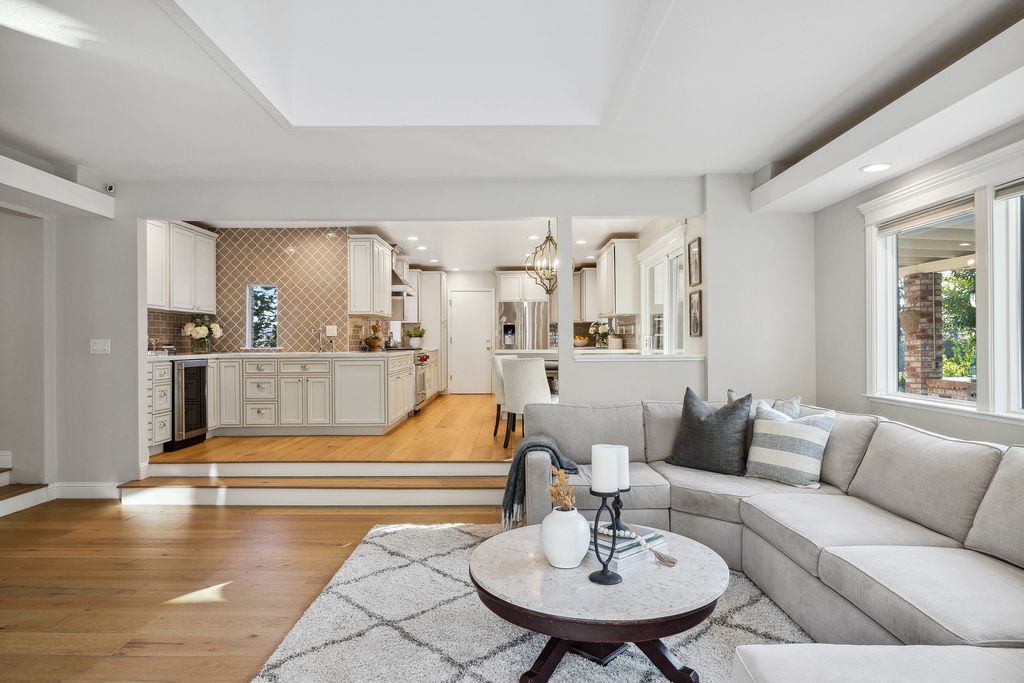 1941 Parkmont Drive, Alamo, California is beautiful remodeled custom home features a resort-like backyard with pool, spa, outdoor kitchen, built-in fire pit, bocce court, expansive level grassy area to play, sport court location, producing vineyard, vegetable garden beds, & fruit trees.
