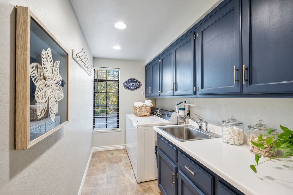 1941 Parkmont Drive, Alamo, California is beautiful remodeled custom home features a resort-like backyard with pool, spa, outdoor kitchen, built-in fire pit, bocce court, expansive level grassy area to play, sport court location, producing vineyard, vegetable garden beds, & fruit trees.