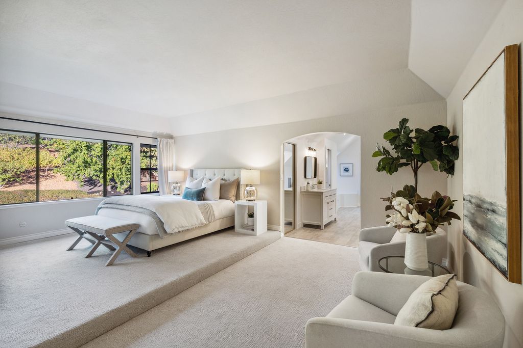 1941 Parkmont Drive, Alamo, California is beautiful remodeled custom home features a resort-like backyard with pool, spa, outdoor kitchen, built-in fire pit, bocce court, expansive level grassy area to play, sport court location, producing vineyard, vegetable garden beds, & fruit trees.