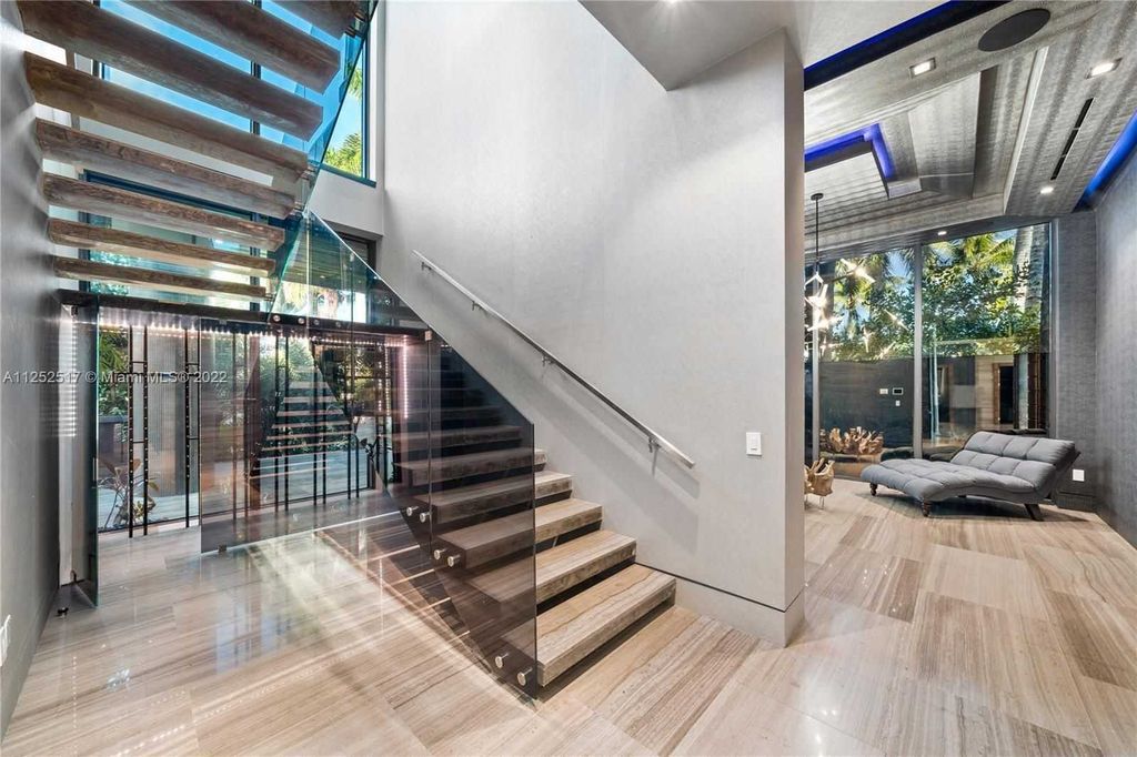 158 Palm Avenue, Miami Beach, Florida is a new construction masterpiece in one of the most coveted Miami Beach gated communities with 100' water frontage, stunning bay and skyline views.