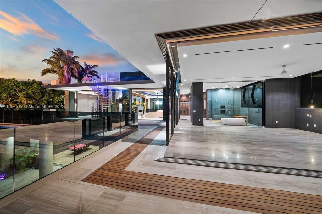 158 Palm Avenue, Miami Beach, Florida is a new construction masterpiece in one of the most coveted Miami Beach gated communities with 100' water frontage, stunning bay and skyline views.