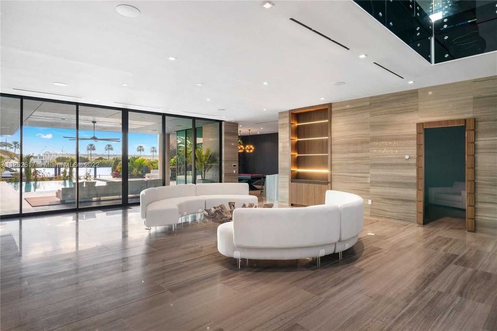 158 Palm Avenue, Miami Beach, Florida is a new construction masterpiece in one of the most coveted Miami Beach gated communities with 100' water frontage, stunning bay and skyline views.