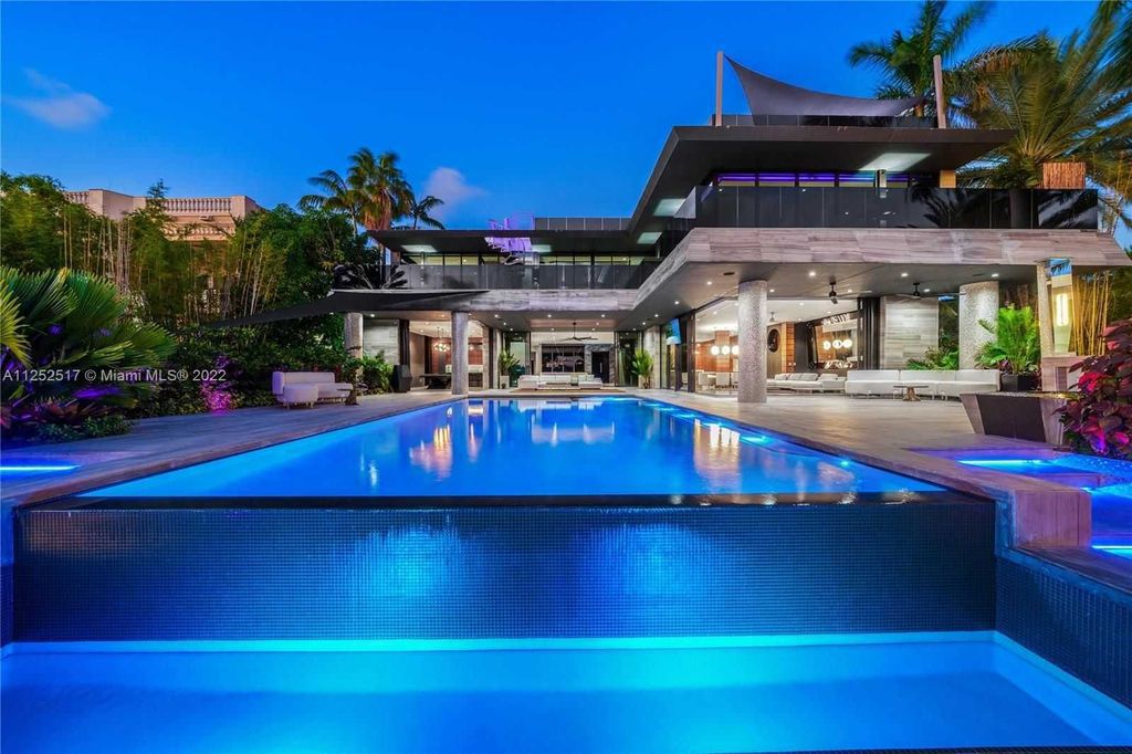 158 Palm Avenue, Miami Beach, Florida is a new construction masterpiece in one of the most coveted Miami Beach gated communities with 100' water frontage, stunning bay and skyline views.