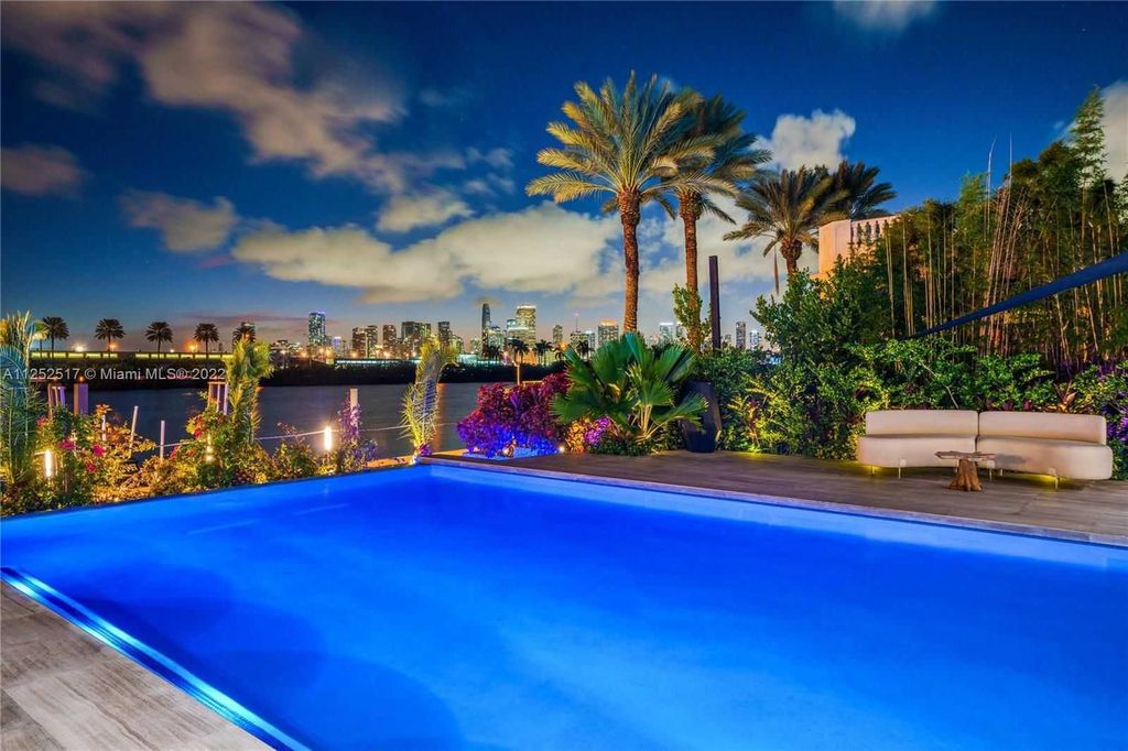158 Palm Avenue, Miami Beach, Florida is a new construction masterpiece in one of the most coveted Miami Beach gated communities with 100' water frontage, stunning bay and skyline views.