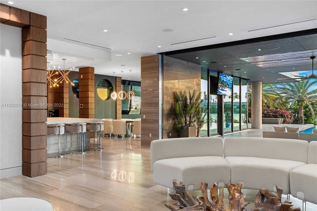158 Palm Avenue, Miami Beach, Florida is a new construction masterpiece in one of the most coveted Miami Beach gated communities with 100' water frontage, stunning bay and skyline views.