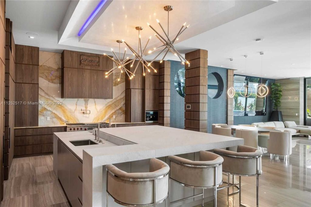 158 Palm Avenue, Miami Beach, Florida is a new construction masterpiece in one of the most coveted Miami Beach gated communities with 100' water frontage, stunning bay and skyline views.