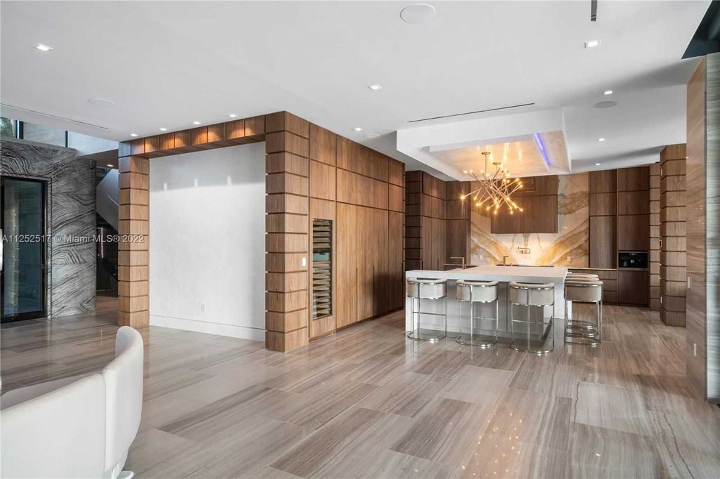 158 Palm Avenue, Miami Beach, Florida is a new construction masterpiece in one of the most coveted Miami Beach gated communities with 100' water frontage, stunning bay and skyline views.