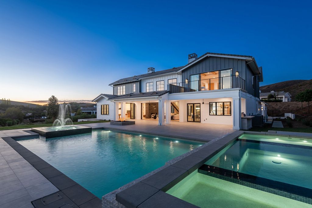 The Home in Thousand Oaks, a special property in the ultra exclusive gated community with extraordinary quality finishes, sensational views and beautiful grounds boasting a custom pool, spa, multiple fountains and lush professional landscape is now available for sale. This home located at 1690 Miller Ranch Dr, Thousand Oaks, California