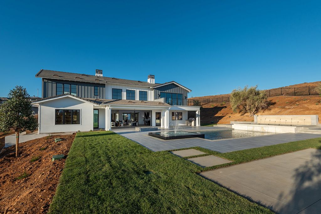 The Home in Thousand Oaks, a special property in the ultra exclusive gated community with extraordinary quality finishes, sensational views and beautiful grounds boasting a custom pool, spa, multiple fountains and lush professional landscape is now available for sale. This home located at 1690 Miller Ranch Dr, Thousand Oaks, California