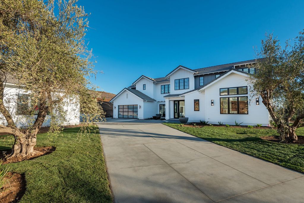 The Home in Thousand Oaks, a special property in the ultra exclusive gated community with extraordinary quality finishes, sensational views and beautiful grounds boasting a custom pool, spa, multiple fountains and lush professional landscape is now available for sale. This home located at 1690 Miller Ranch Dr, Thousand Oaks, California