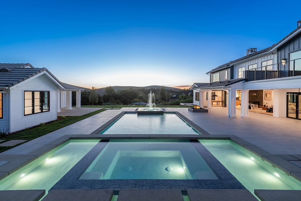 The Home in Thousand Oaks, a special property in the ultra exclusive gated community with extraordinary quality finishes, sensational views and beautiful grounds boasting a custom pool, spa, multiple fountains and lush professional landscape is now available for sale. This home located at 1690 Miller Ranch Dr, Thousand Oaks, California