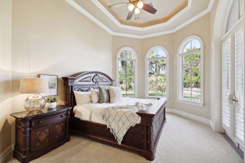 2539 Escada Court, Naples, Florida is a custom-built estate just minutes to world class beaches, shopping and fine dining with picturesque pool and lake views from just about every room.