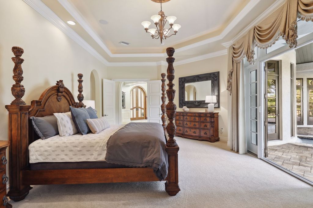 2539 Escada Court, Naples, Florida is a custom-built estate just minutes to world class beaches, shopping and fine dining with picturesque pool and lake views from just about every room.